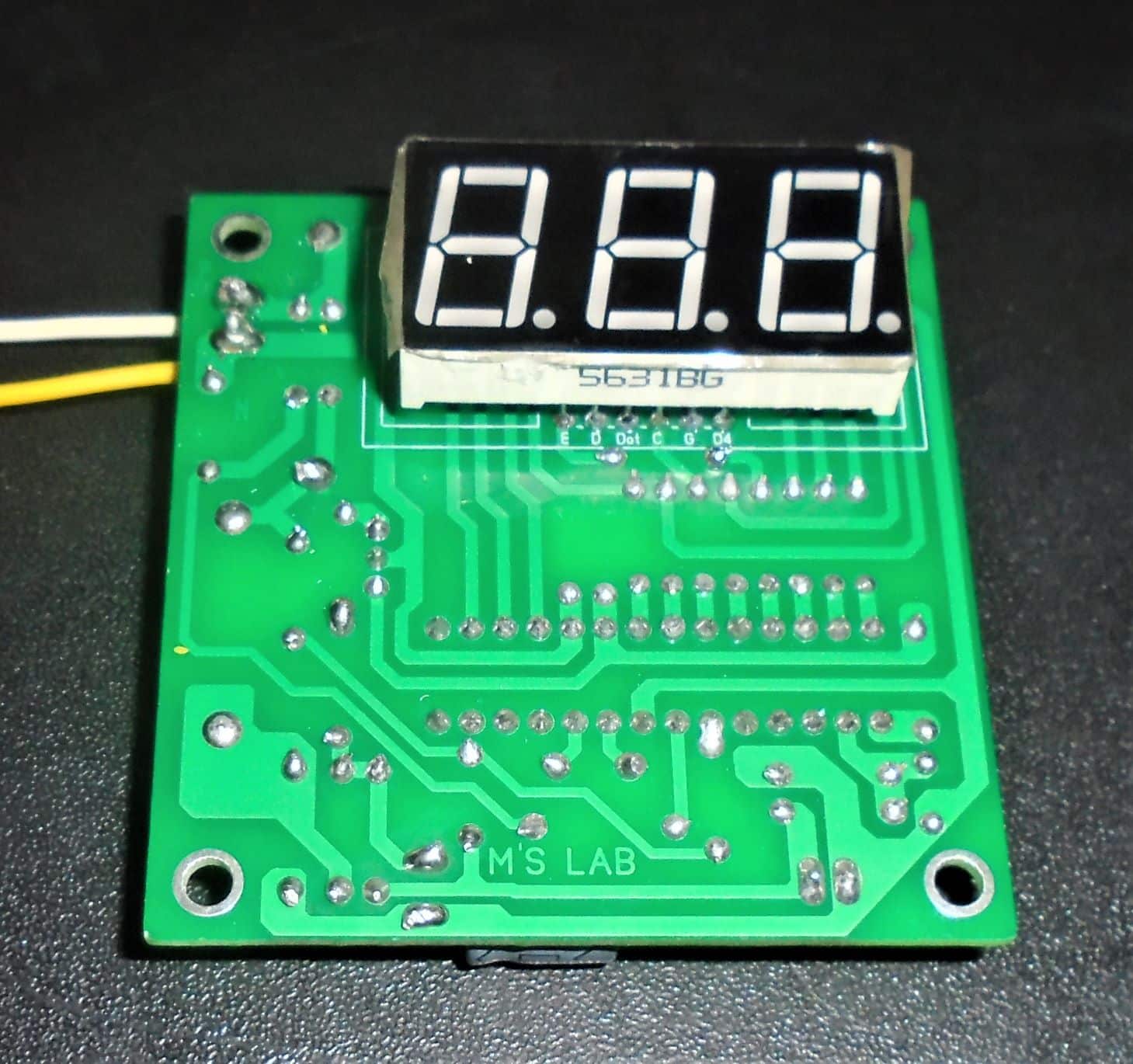 AC voltmeter using a PIC16F76 micro-controller and capacitor power supply